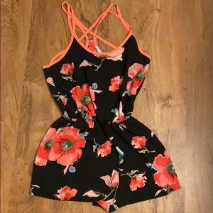 Floral romper with crossed back